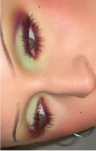 Green and pink eye makeup