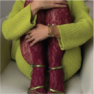 Green knit and burgundy trousers