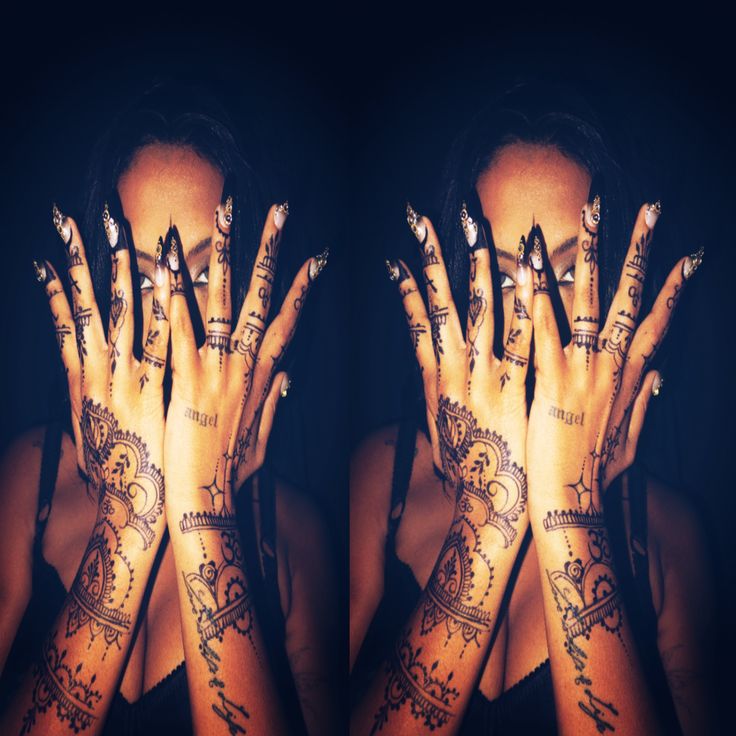 Hands decorated with henna