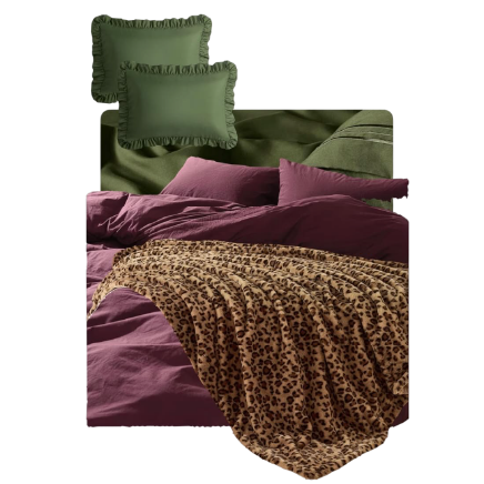 Olive ruffled pillows, plum bedding, and a leopard throw