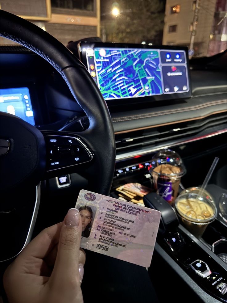 Holding a drivers license in a car