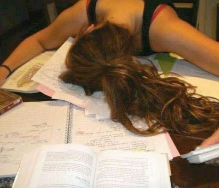 Reality: slumped over textbooks and notes